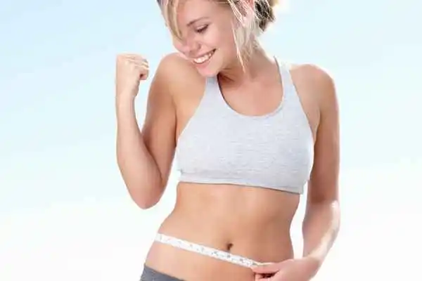 woman happy after fat reduction treatment Prestwich