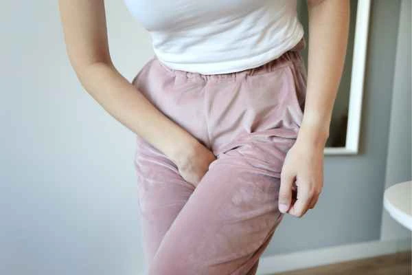 woman struggling with urine incontinence Prestwich
